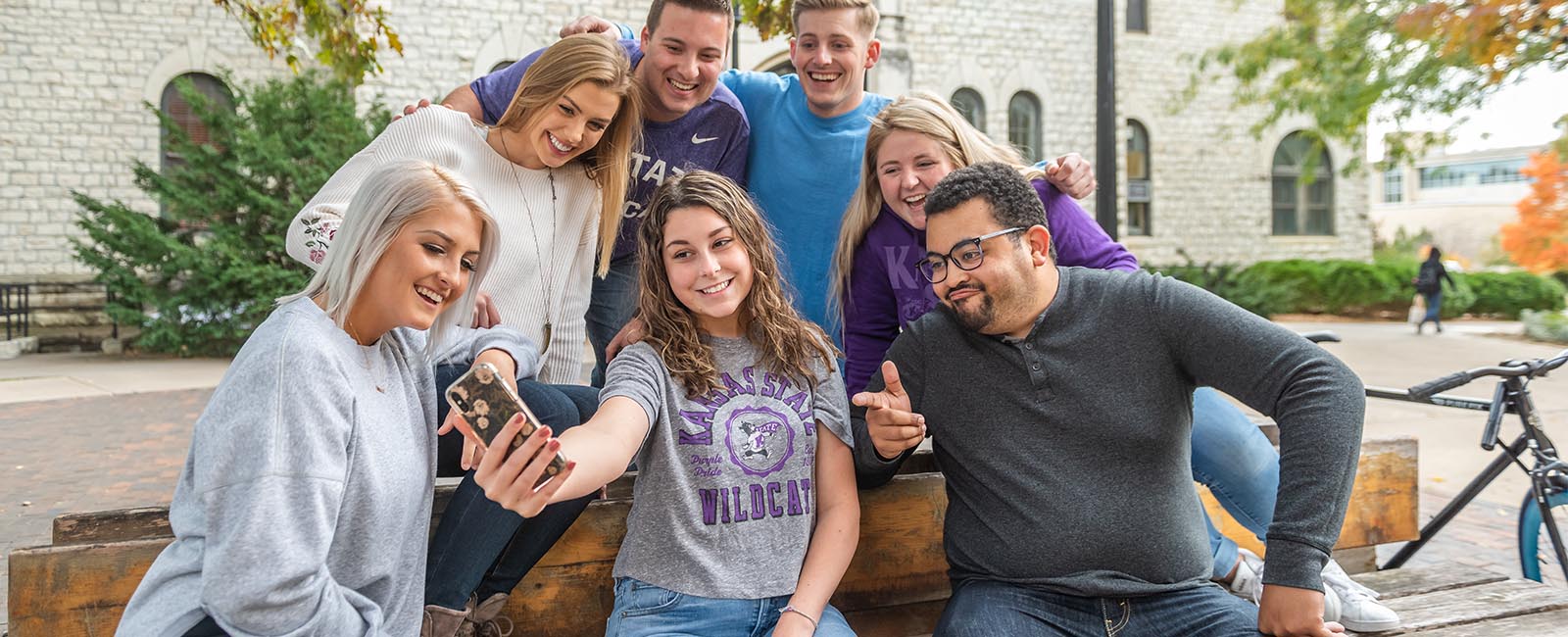 Students on campus taking a selfie