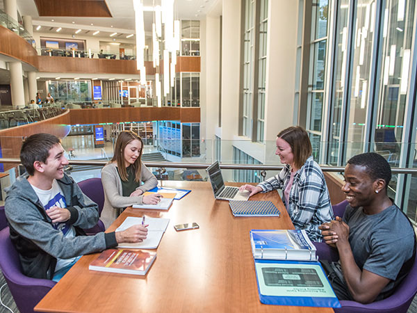 Student meeting together in the College of Business